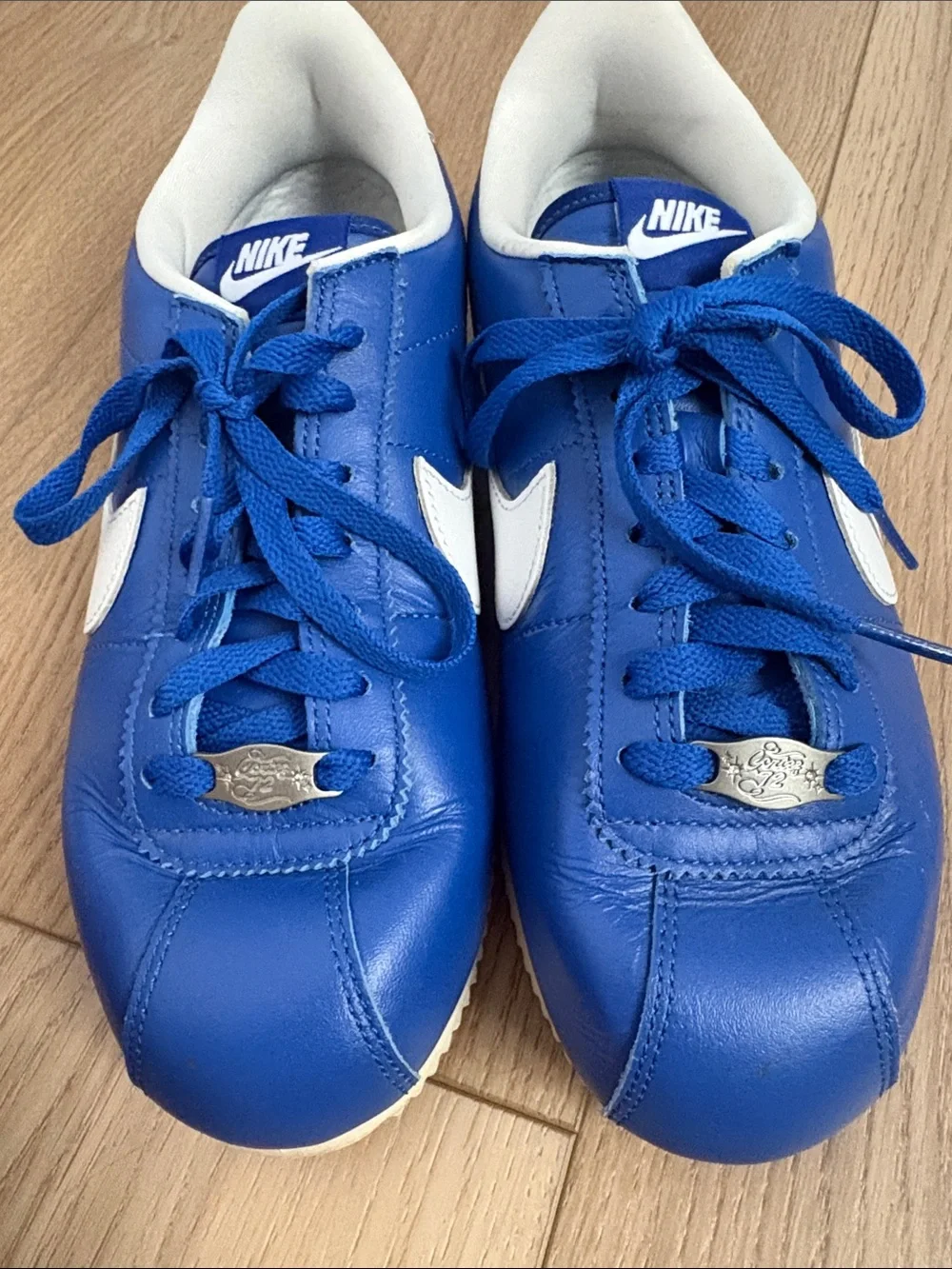 Nike Men’s Royal Blue and White Leather Sneakers